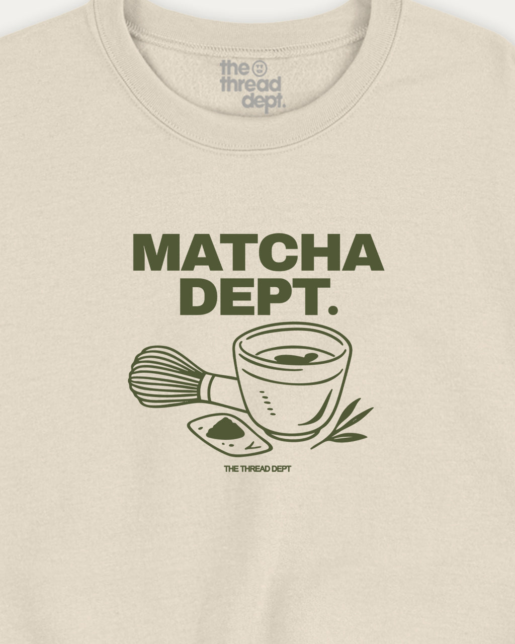 Beige t-shirt with 'Matcha Dept.' graphic and text on a beige background
