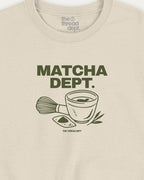 Beige t-shirt with 'Matcha Dept.' graphic and text on a beige background