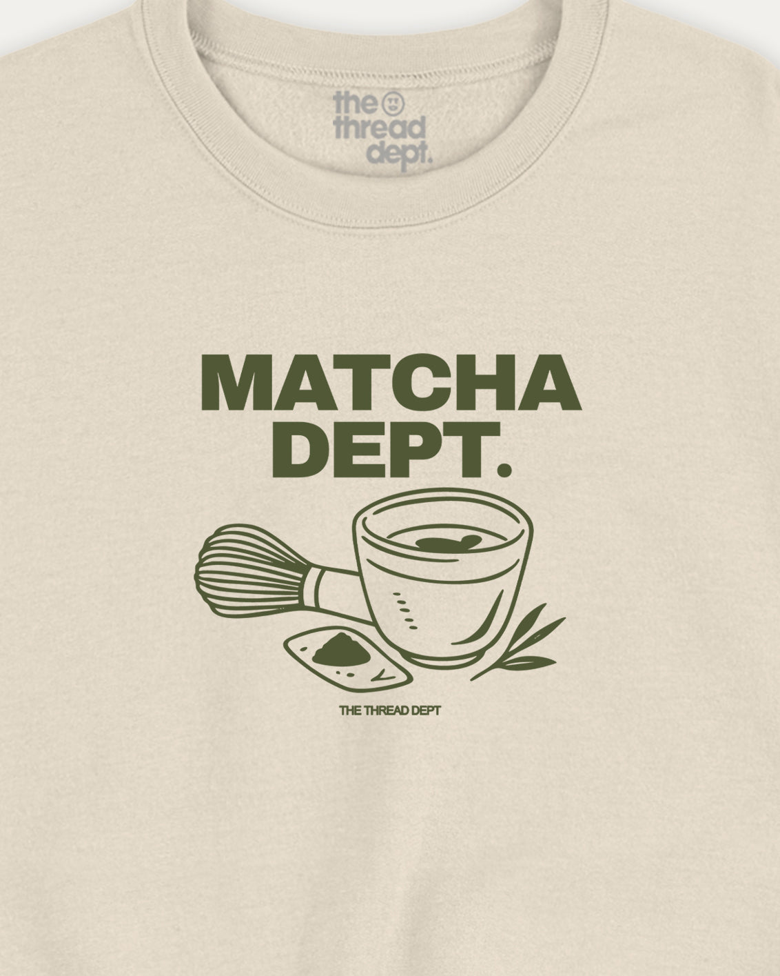 Beige t-shirt with 'Matcha Dept.' graphic and text on a beige background