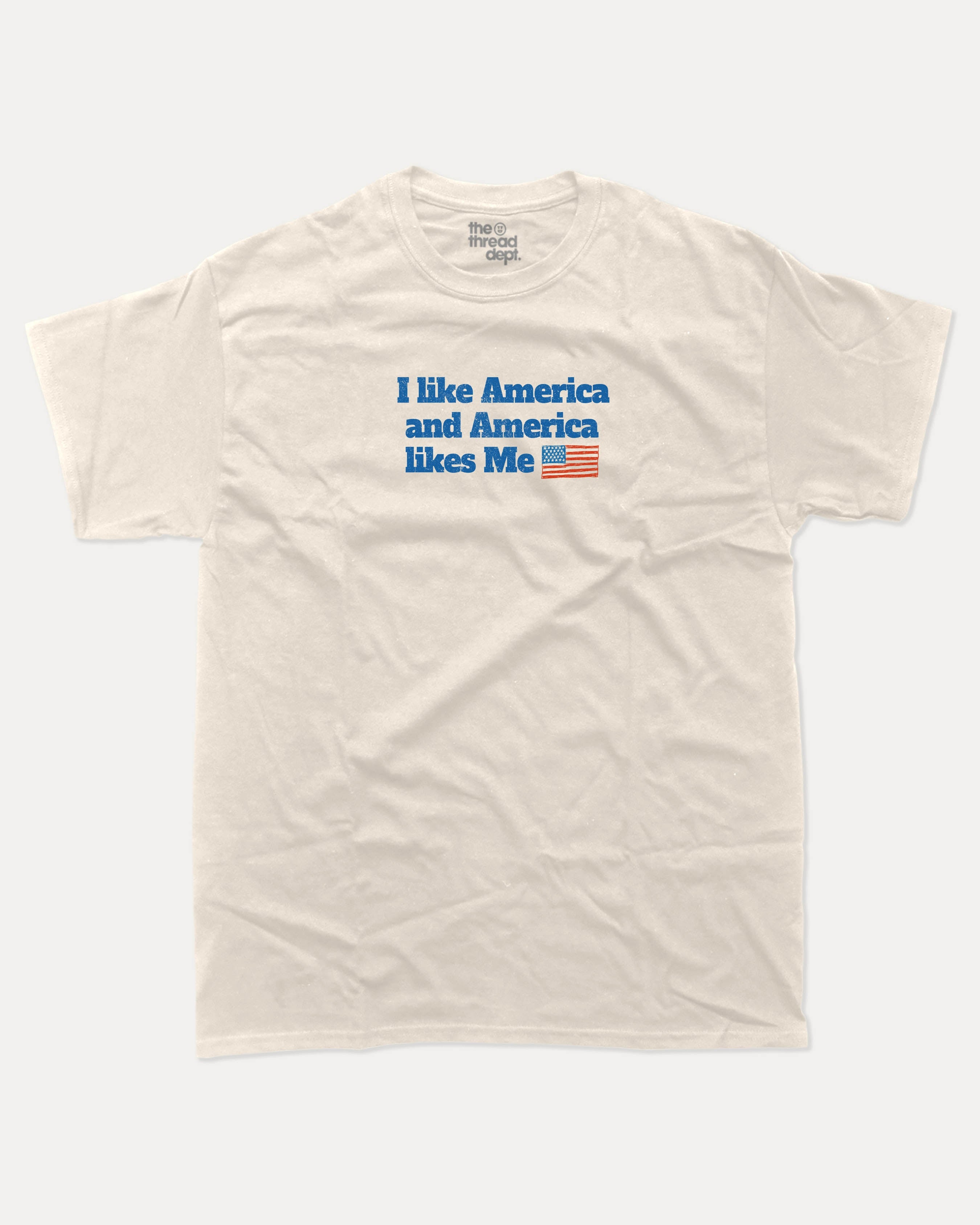 I like America and America likes me graphic tee with bold and humorous print, Perfect Gift for Patriotic People, funny and trendy graphic. Perfect for adults and gift-giving. Cream shirt.