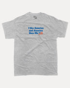 I like America and America likes me graphic tee with bold and humorous print, Perfect Gift for Patriotic People, funny and trendy graphic. Perfect for adults and gift-giving. Heather Grey shirt.