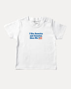 I like America and America likes me graphic tee with bold and humorous print, Perfect Gift for Patriotic People, funny and trendy graphic. Perfect for adults and gift-giving. White shirt.