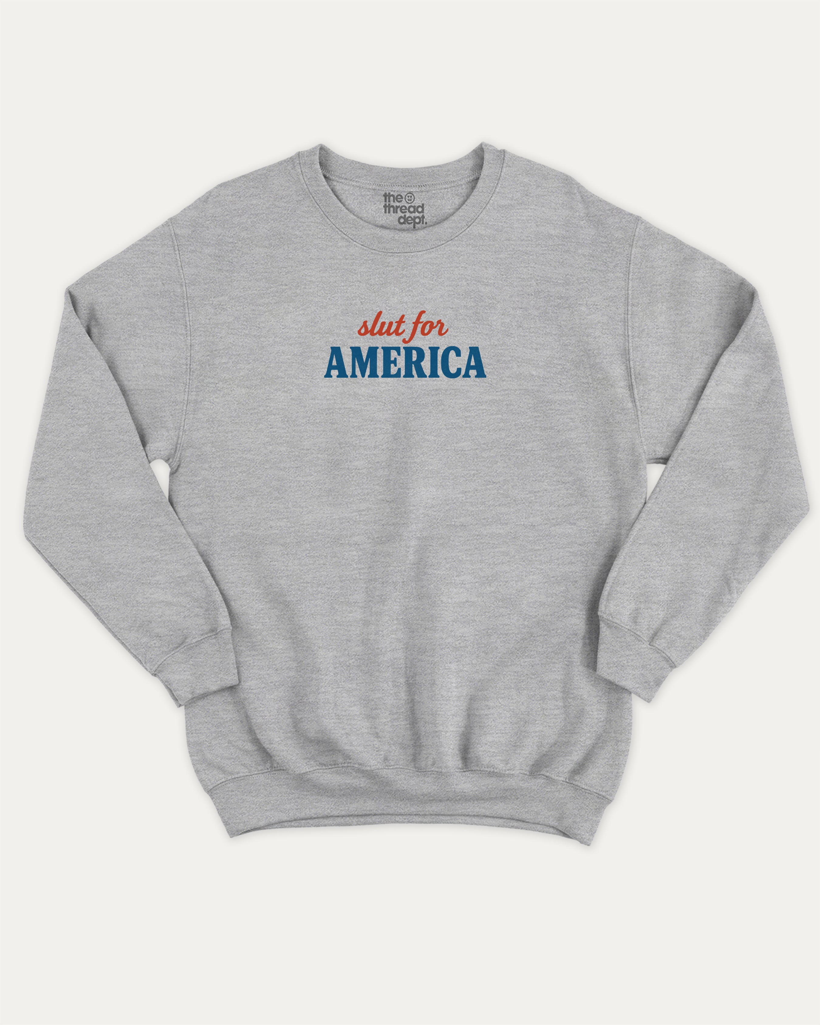 Slut For America graphic sweatshirt with bold and humorous print, warm and cozy graphic for everyday wear. Perfect for adults and gift-giving. Heather Grey pullover.