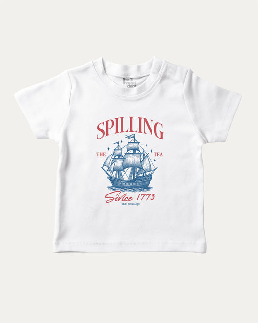 Spilling The Tea playful kids' graphic tee, perfect for boys and girls. A must-have fun shirt for school, playtime, or gifting. White baby t-shirt
