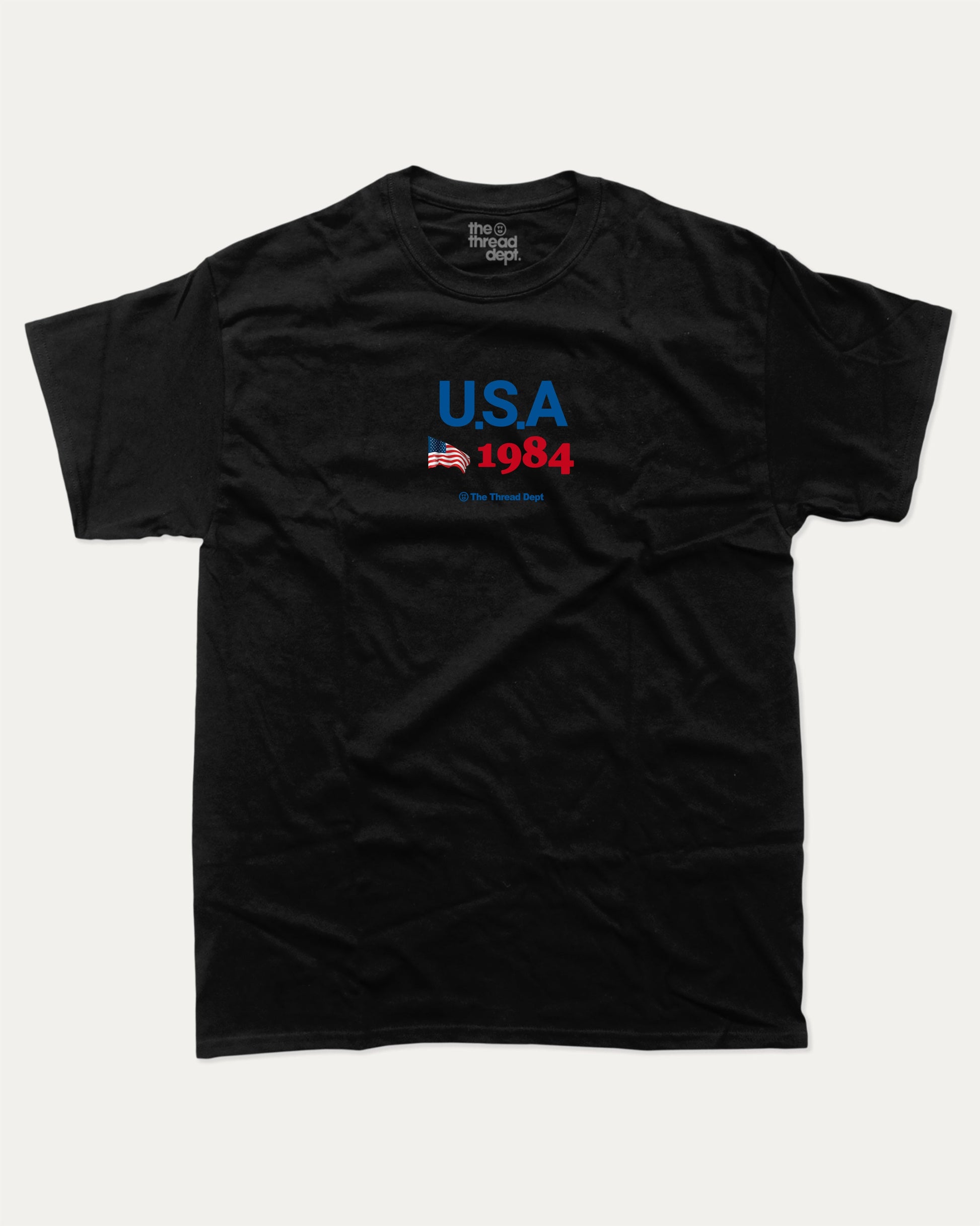 USA 1984 graphic t-shirt, perfect for adults. making it an ideal gift for national holidays like the 4th of July or for individuals who take pride in their country's heritage. Black.