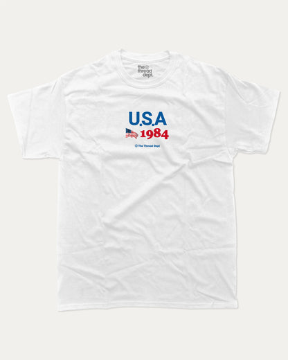 USA 1984 graphic t-shirt, perfect for adults. making it an ideal gift for national holidays like the 4th of July or for individuals who take pride in their country's heritage. White.
