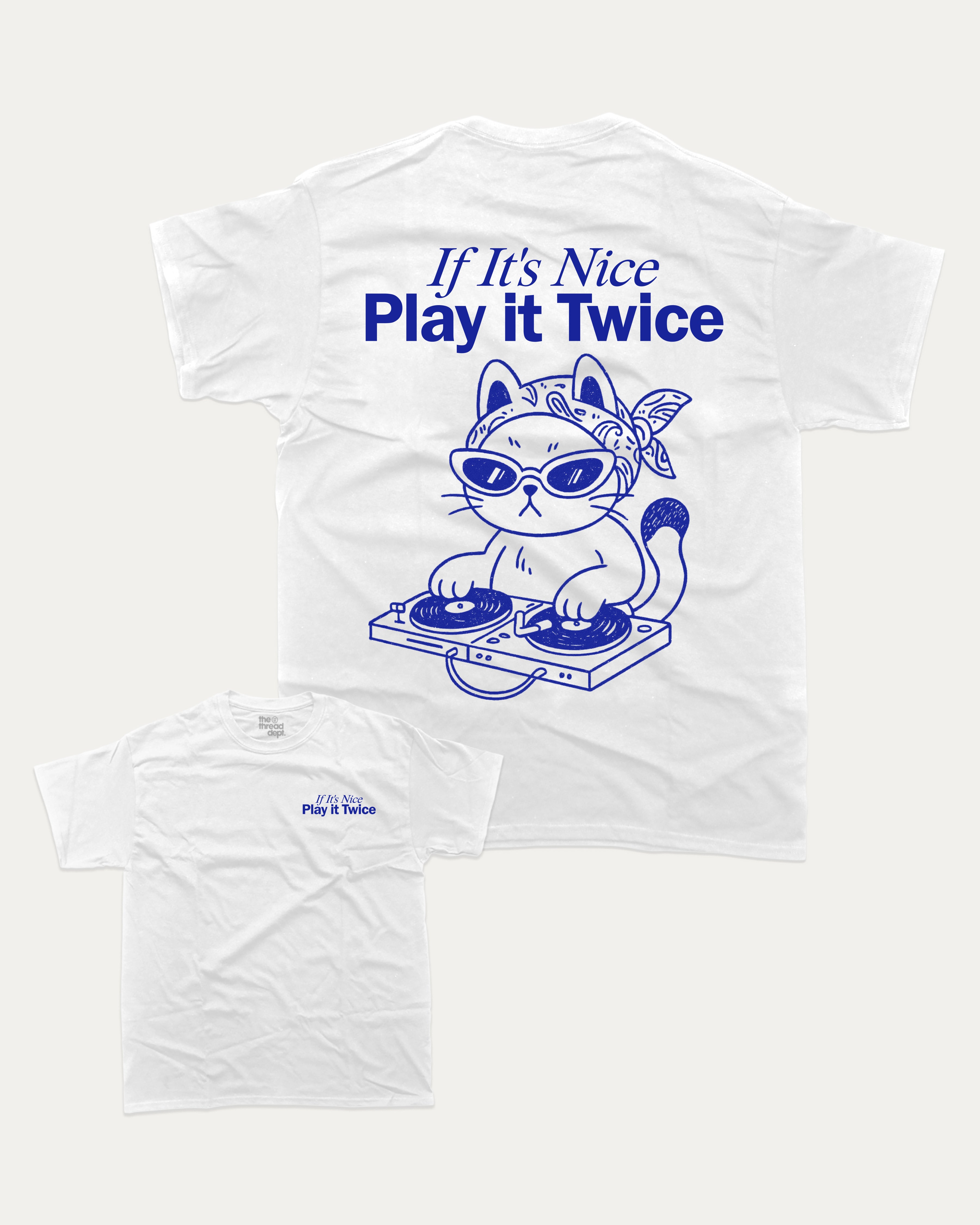White t-shirt with a cat graphic and text 'If It's Nice Play it Twice' on a white background