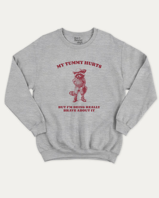 Gray sweatshirt with my tummy hurts but i'm being really brave about it graphic and text on a white background