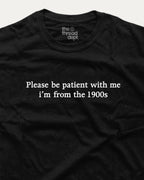 Black t-shirt with white text 'Please be patient with me i'm from the 1900s' and 'the thread dept.' logo.