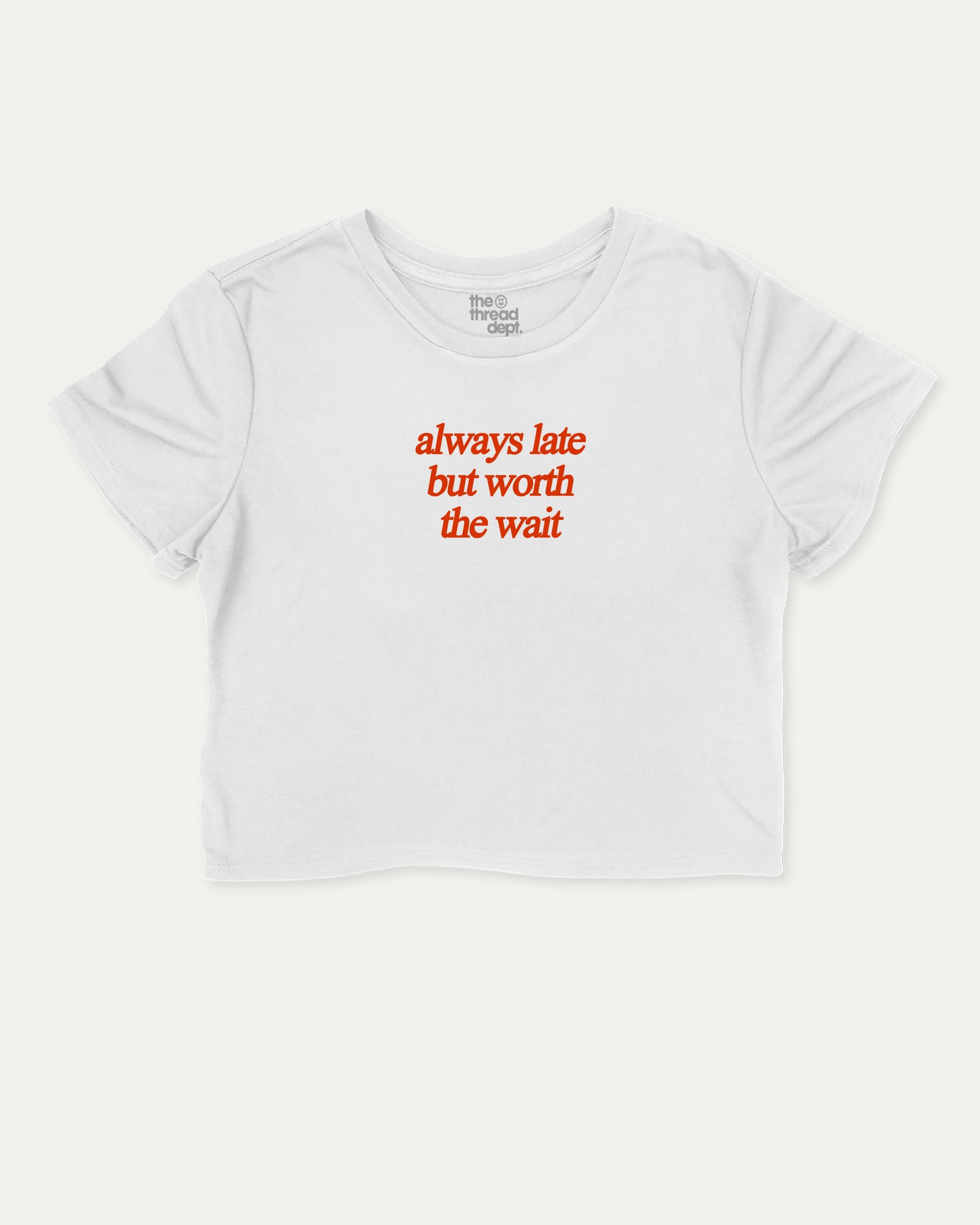 always late but worth the wait graphic crop tee with funny and trendy slogan print, perfect for women’s casual looks or layering. White crop t-shirt.