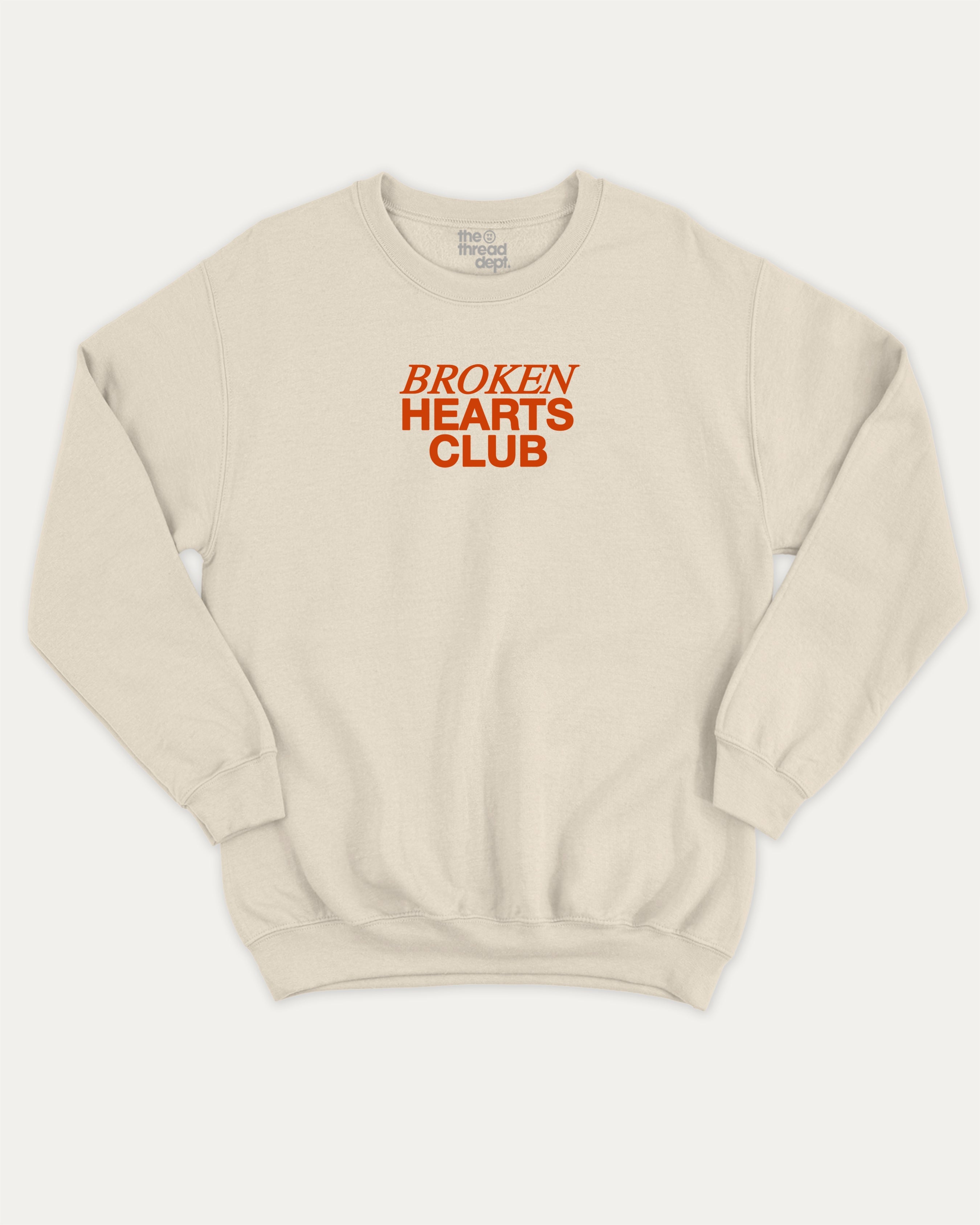 Broken Hearts Club graphic sweatshirt with bold and humorous print, warm and cozy graphic for everyday wear. Perfect for adults and gift-giving. Natural pullover.