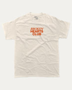 Broken Hearts Club graphic tee with bold and humorous print, funny and trendy graphic. Vintage Inspired Graphic t shirt, Retro Inspired Graphic T shirt,  Perfect for adults and gift-giving. Cream shirt.