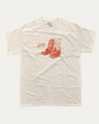 Cowboy Romance graphic t-shirt with retro western print, funny and trendy graphic. Perfect gifts for friends and family. Cream shirt.