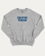 Creative Person graphic sweatshirt with bold and humorous print, warm and cozy graphic for everyday wear. Perfect for adults and gift-giving. Heather Grey pullover.