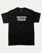 Creative Person graphic tee with bold and humorous print, funny and trendy graphic. Perfect for adults and gift-giving. Black shirt.