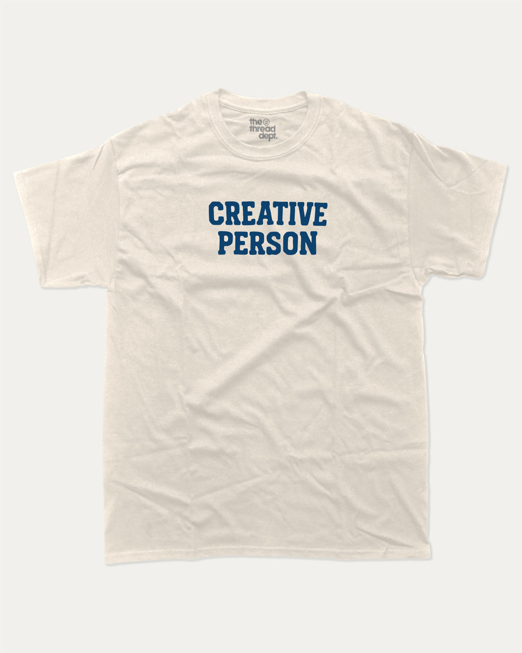 Creative Person graphic tee with bold and humorous print, funny and trendy graphic. Perfect for adults and gift-giving. Cream shirt.
