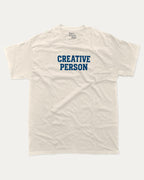 Creative Person graphic tee with bold and humorous print, funny and trendy graphic. Perfect for adults and gift-giving. Cream shirt.
