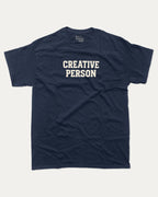 Creative Person graphic tee with bold and humorous print, funny and trendy graphic. Perfect for adults and gift-giving. True Navy shirt.