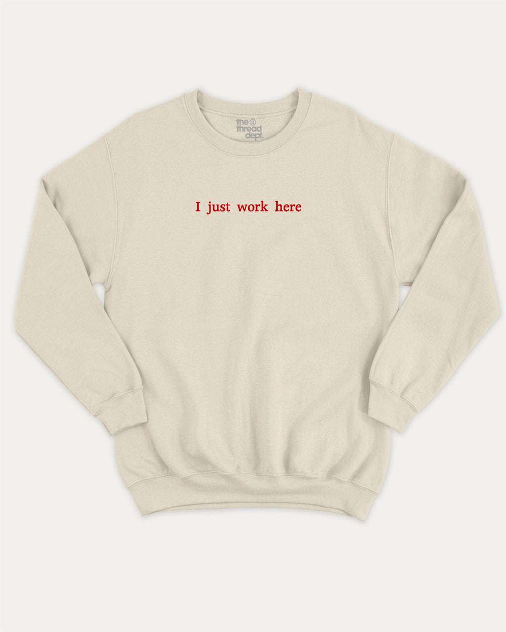 I Just Work Here graphic sweatshirt with bold and retro print, warm and cozy graphic for everyday wear. Perfect for adults and gift-giving. Natural pullover.