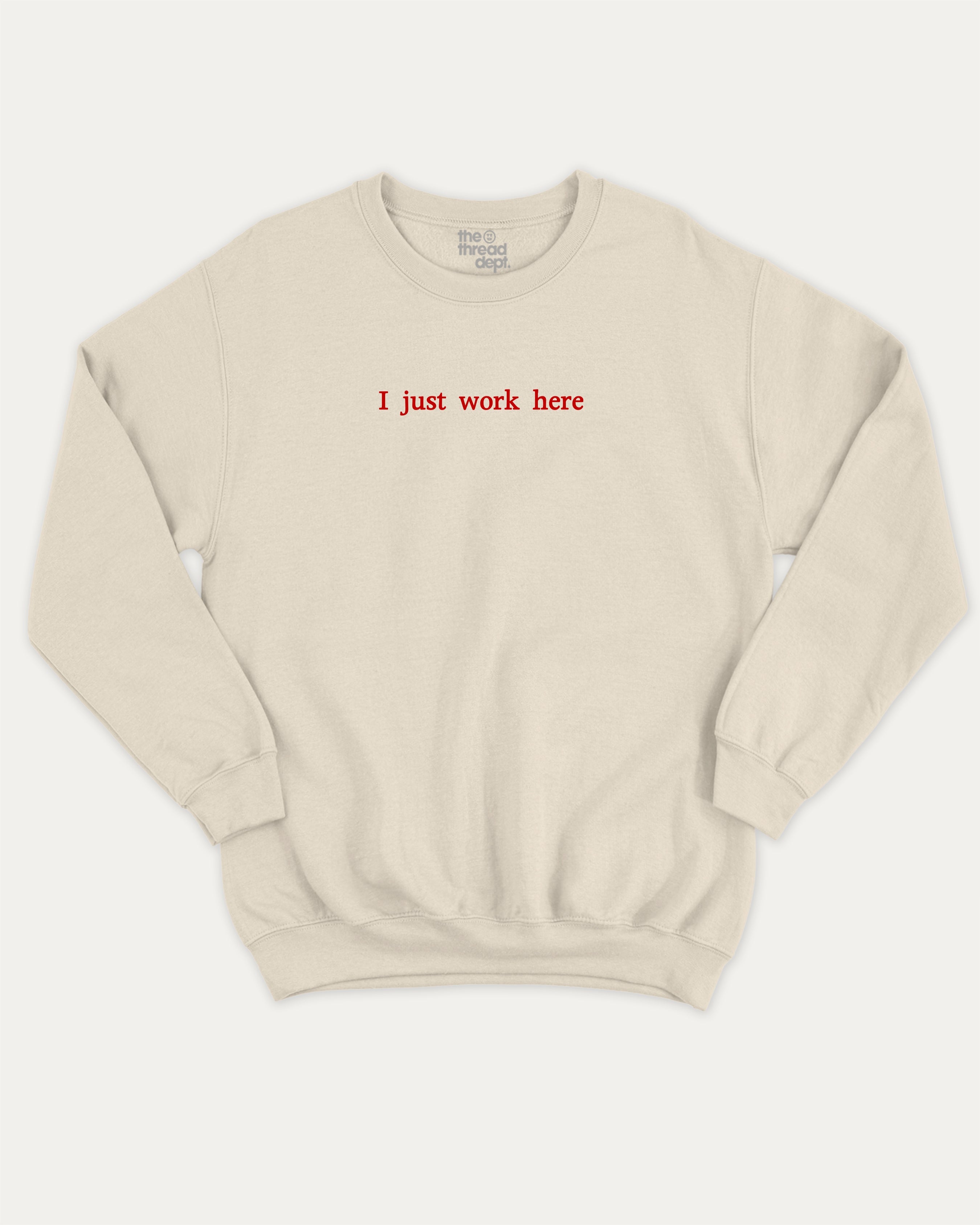 I Just Work Here graphic sweatshirt with bold and retro print, warm and cozy graphic for everyday wear. Perfect for adults and gift-giving. Natural pullover.