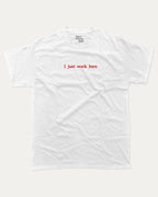 I Just Work Here graphic tee with bold and retro print, funny and trendy graphic. Perfect for adults and gift-giving. White shirt.