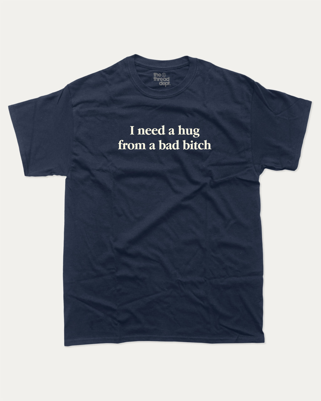 I Need A Hug From A Bad Bitch graphic tee with bold and funny print, funny and trendy graphic. Perfect for adults and gift-giving. True Navy shirt.