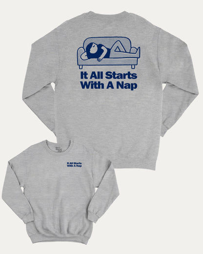 It All Starts With A Nap graphic sweatshirt with bold and humorous print, warm and cozy graphic for everyday wear. Perfect for adults and gift-giving. Heather Grey pullover.