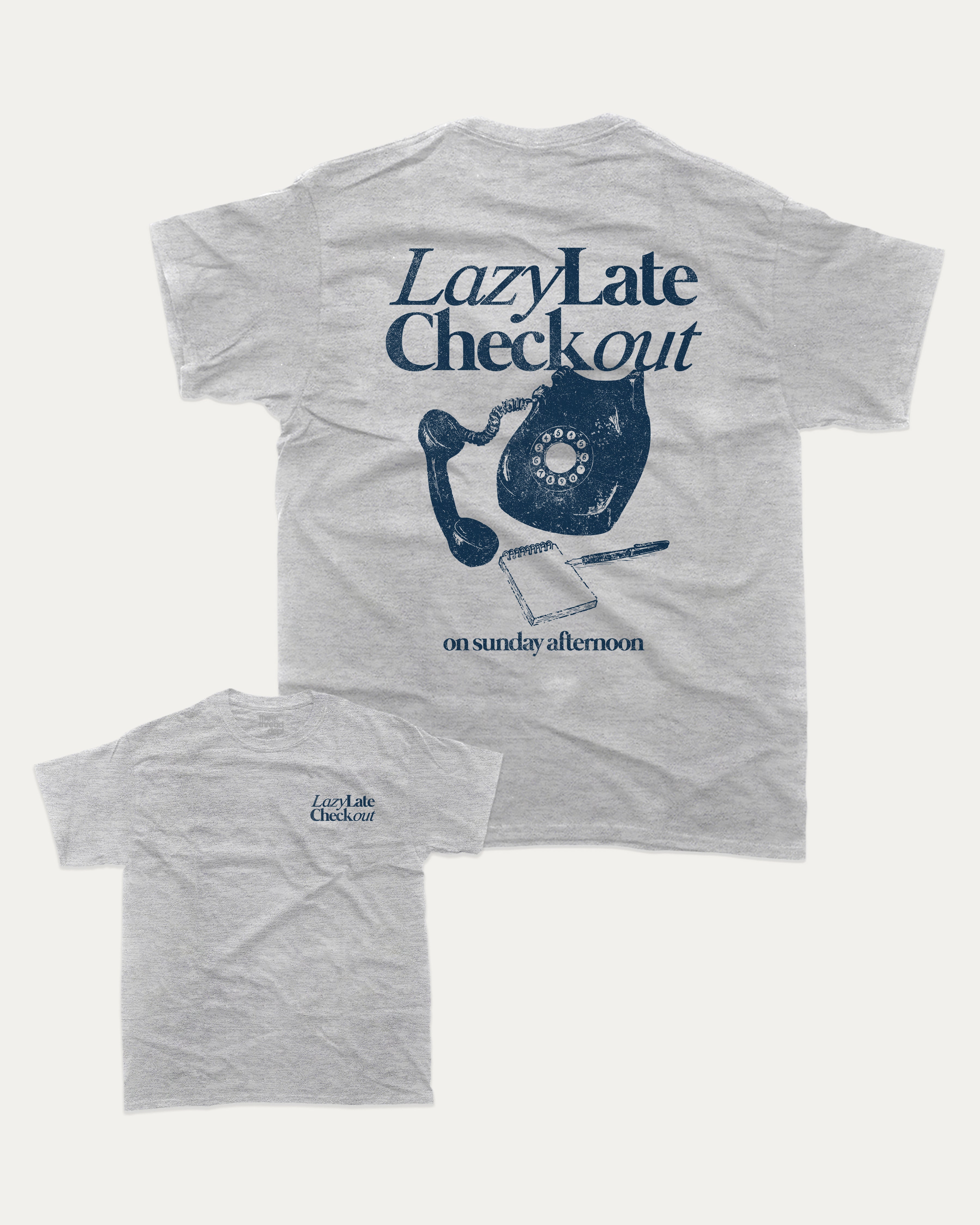 Lazy Late Check Out graphic tee with bold and humorous print, funny and trendy graphic. Retro Inspired Graphic T shirt, Vintage Inspired Graphic T shirt,  Perfect for adults and gift-giving. Heather Grey shirt.