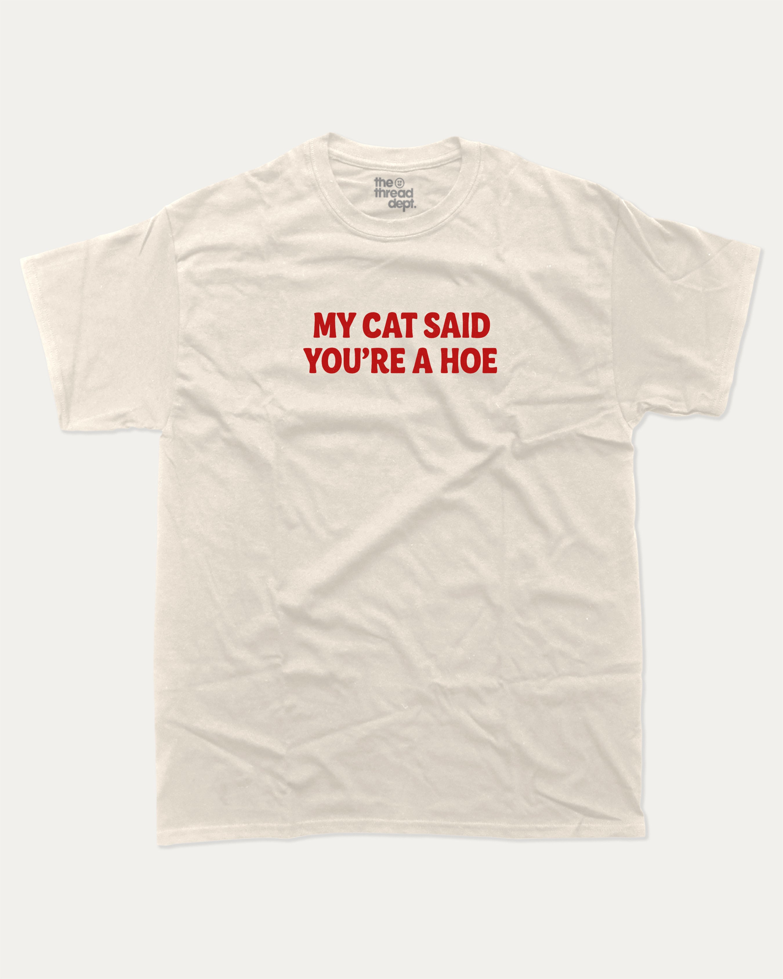 My Cat Said You're A Hoe graphic tee with bold and humorous print, Funny Animal Pun Words Graphic T shirt, Perfect Gift for Cat Lovers, Cat Person Graphic T shirt, funny and trendy graphic. Perfect for adults and gift-giving. Cream shirt.