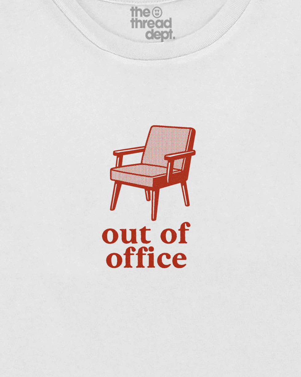 White t-shirt with a red chair graphic and 'out of office' text on a white background.