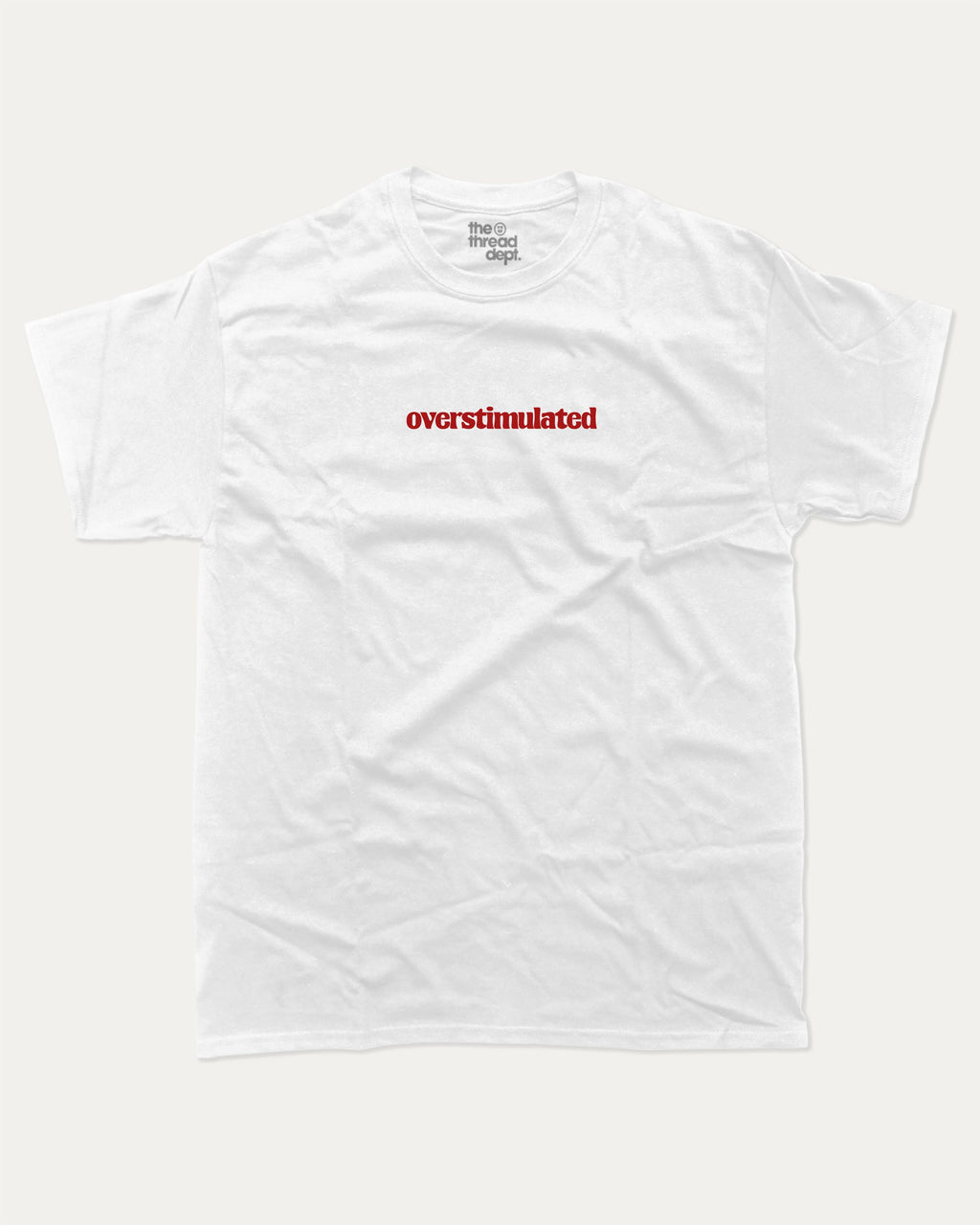 Overstimulated graphic t-shirt with bold and humorous print, funny and trendy graphic. Perfect funny gifts for friends. White shirt.