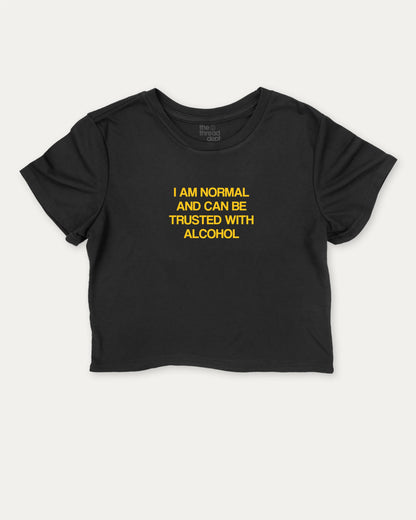Retro I am normal and can be trusted with alcohol graphic crop tee with funny and trendy slogan print, Liquor Drinks Graphic T shirt, Perfect Gift For Alcohol Lover, perfect for women’s casual looks or layering. Black crop t-shirt.