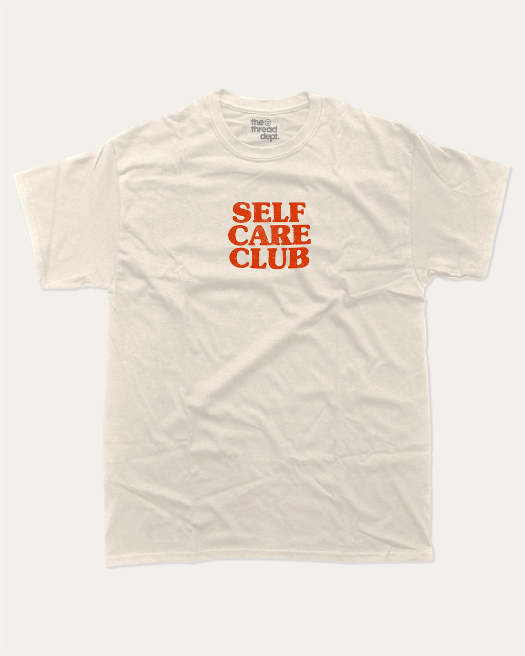 Self Care club graphic tee with bold and humorous print, Retro Inspired Graphic T shirt, Vintage Inspired Graphic T shirt, funny and trendy graphic. Perfect for adults and gift-giving. Cream shirt.