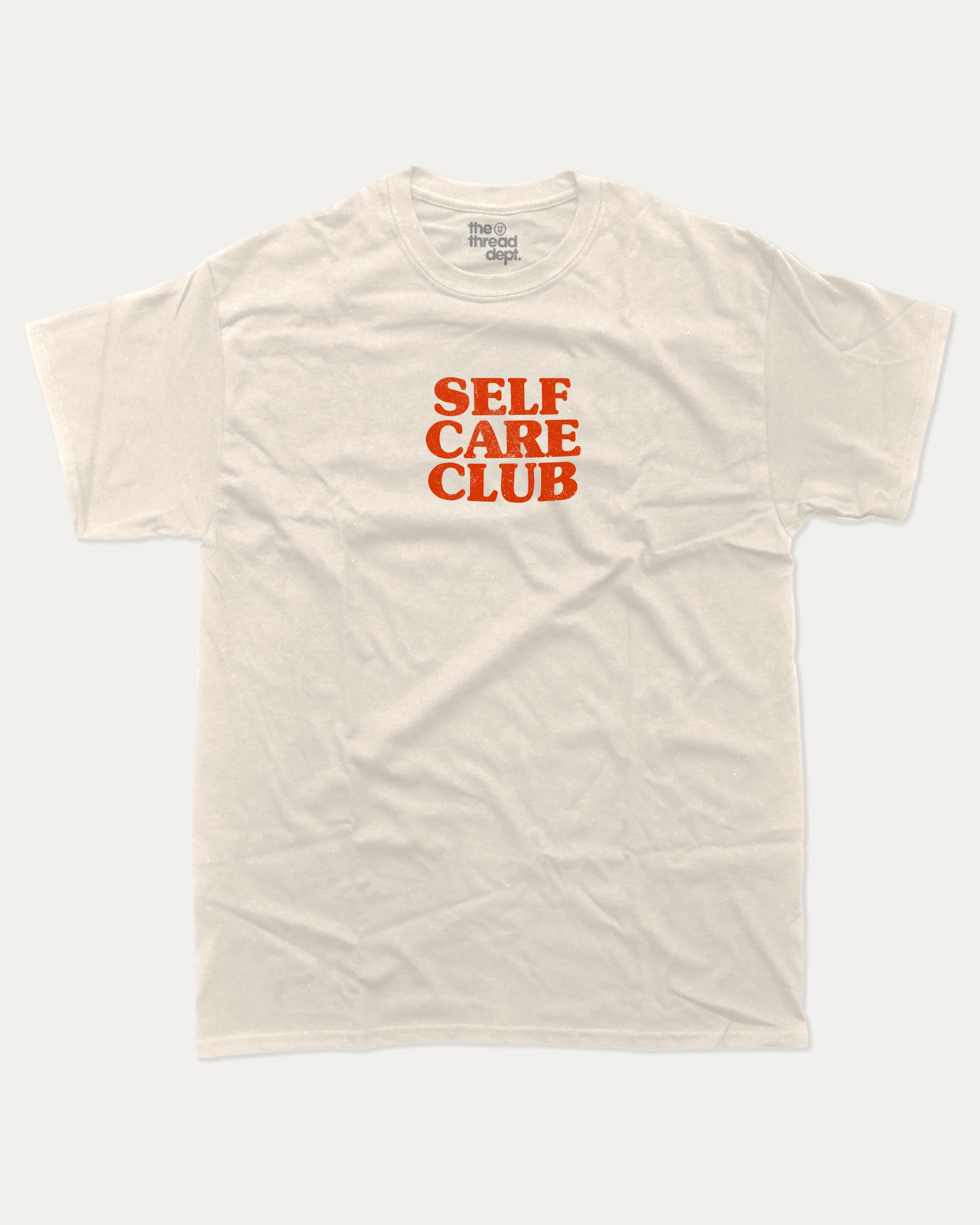 Self Care club graphic tee with bold and humorous print, Retro Inspired Graphic T shirt, Vintage Inspired Graphic T shirt, funny and trendy graphic. Perfect for adults and gift-giving. Cream shirt.
