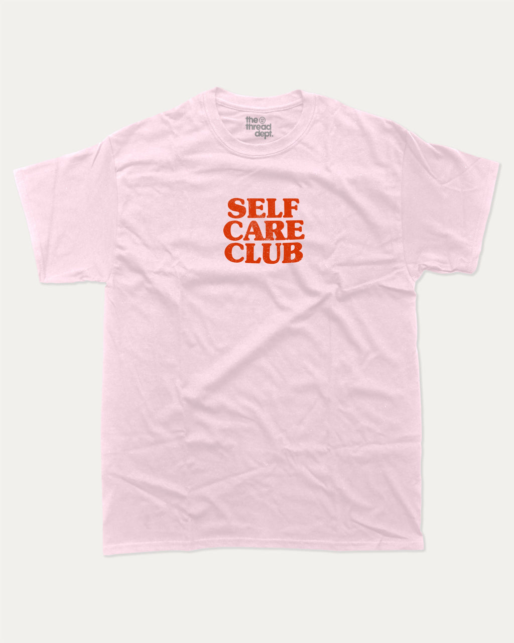 Self Care club graphic tee with bold and humorous print, Retro Inspired Graphic T shirt, Vintage Inspired Graphic T shirt, funny and trendy graphic. Perfect for adults and gift-giving. Pink shirt.