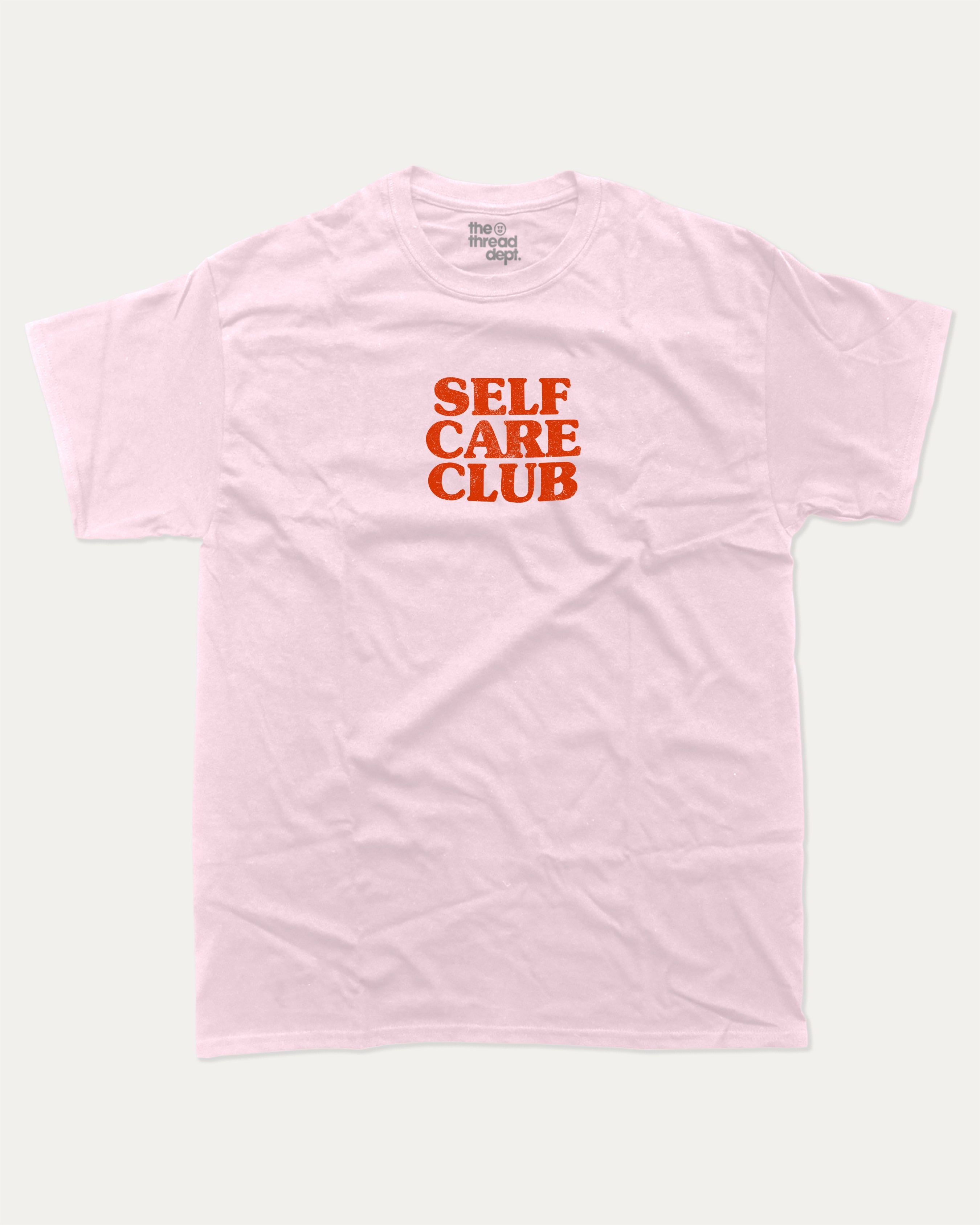 Self Care club graphic tee with bold and humorous print, Retro Inspired Graphic T shirt, Vintage Inspired Graphic T shirt, funny and trendy graphic. Perfect for adults and gift-giving. Pink shirt.