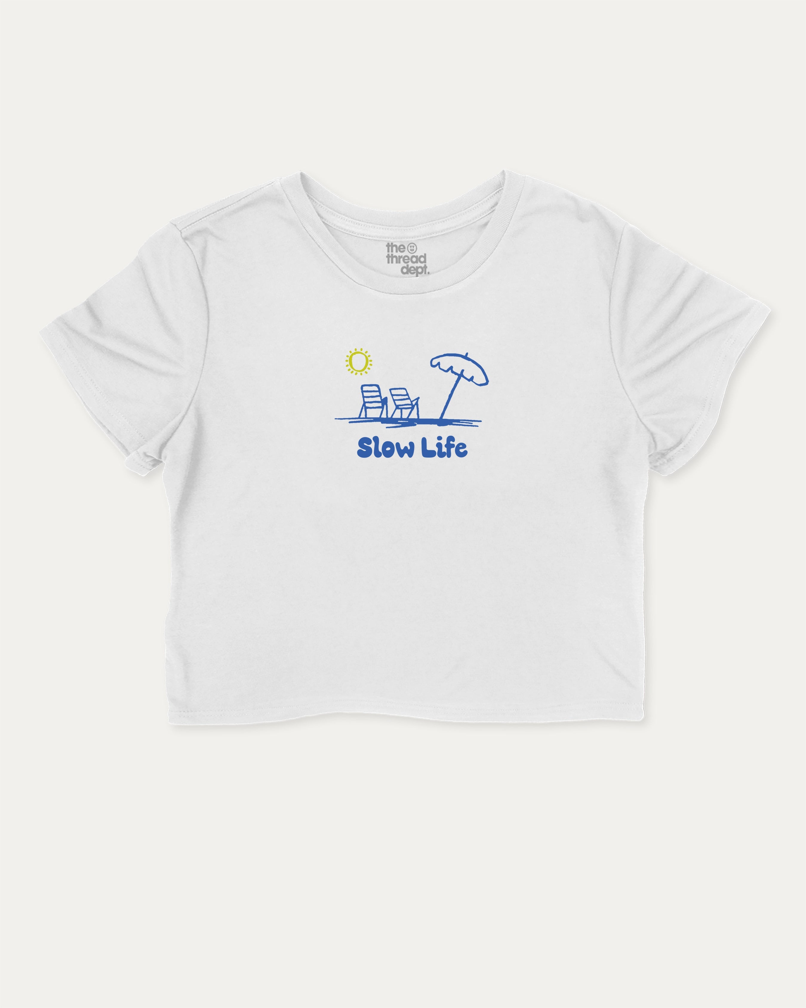 Slow Life graphic crop tee with funny and trendy slogan print, perfect for women_ casual looks or layering. White crop t-shirt.