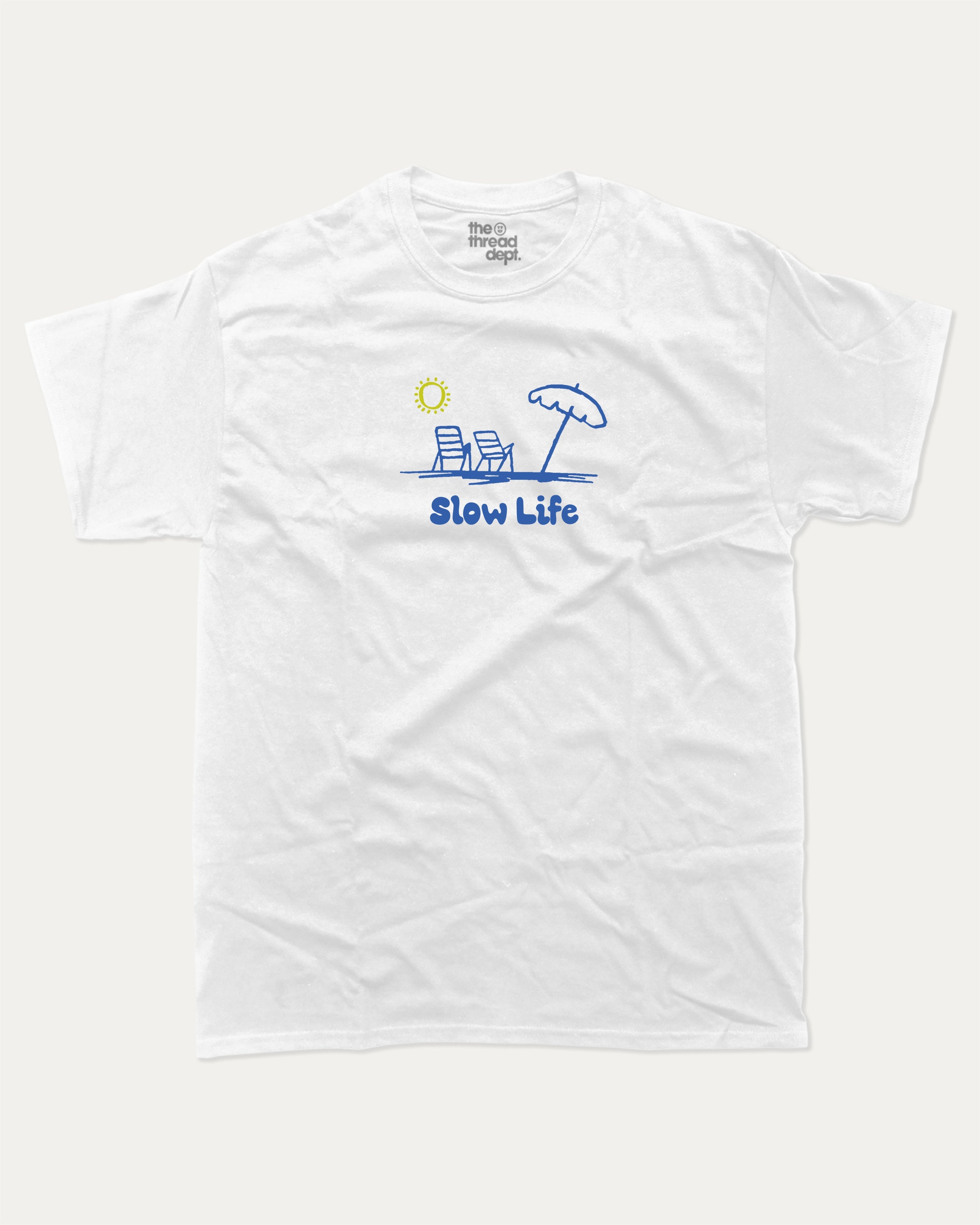 Slow Life graphic tee with bold and humorous print, funny and trendy graphic. Retro Inspired Graphic T shirt, Vintage Inspired Graphic T shirt, Vacation Graphic T shirt, Perfoect Gift for travelers, Perfect for adults and gift-giving. White shirt.