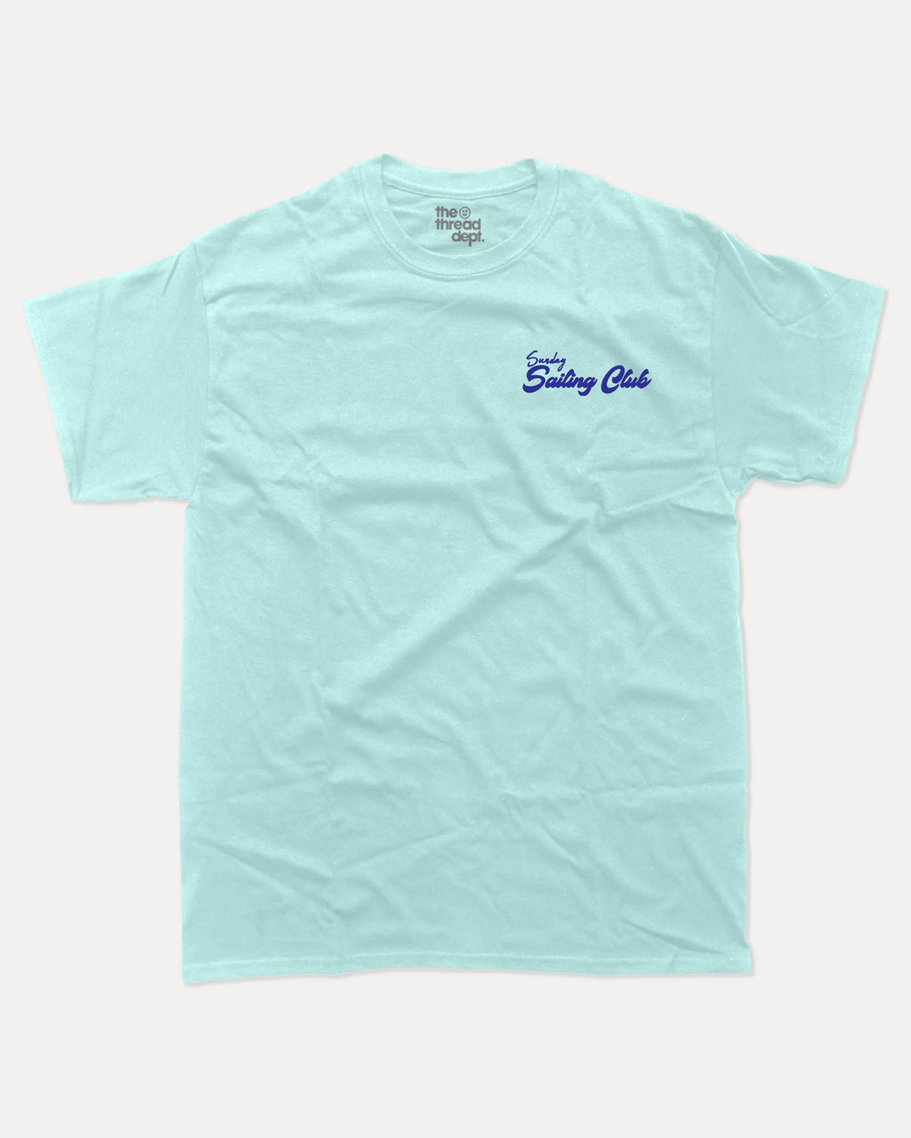Sunday Sailing Club graphic tee with bold and humorous print, Retro Inspired Graphic T shirt, Vintage Inspired Graphic T shirt, Sailing Graphic Tee, Yacht Graphic Tee, funny and trendy graphic. Perfect for adults and gift-giving. Celadon shirt.