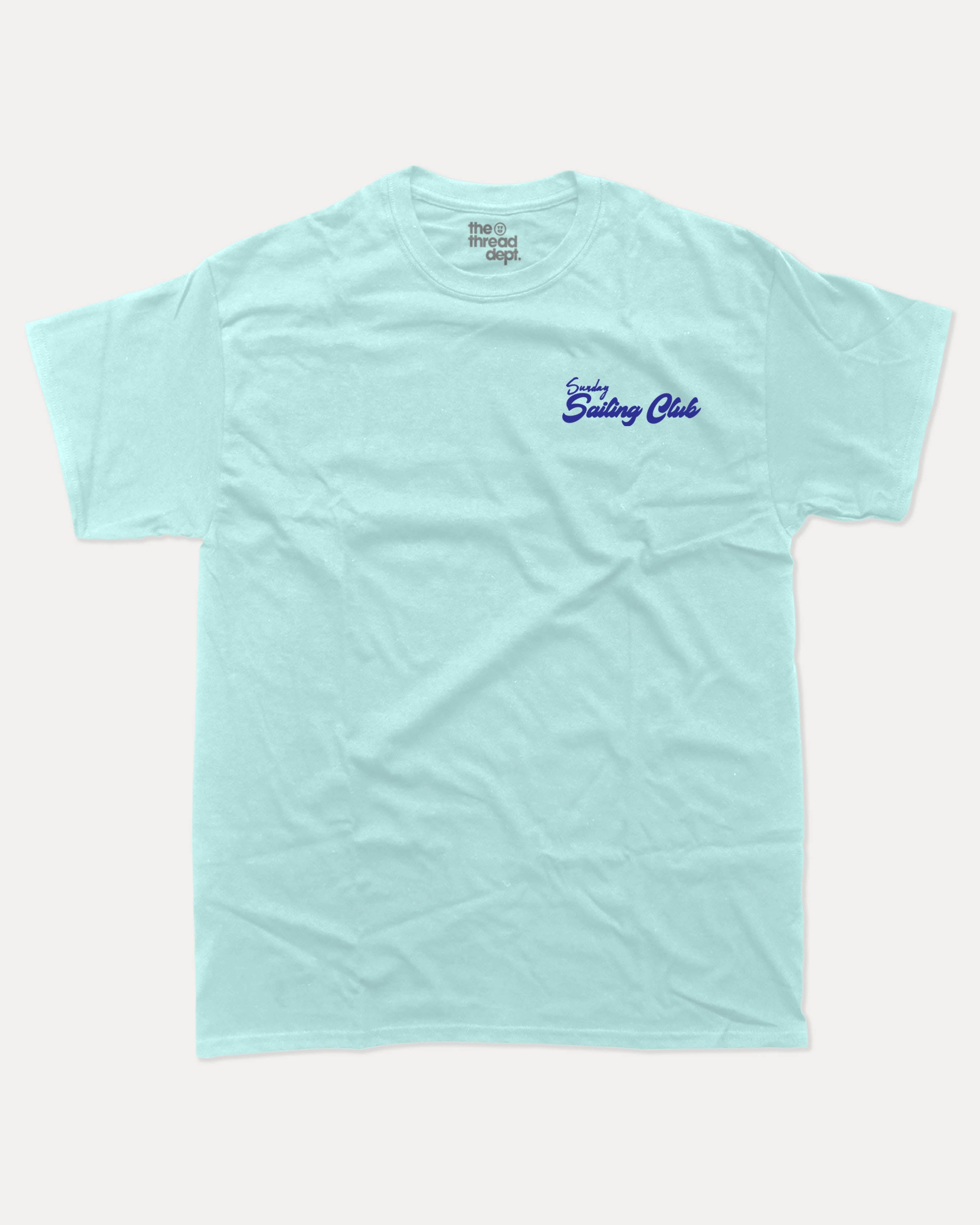 Sunday Sailing Club graphic tee with bold and humorous print, Retro Inspired Graphic T shirt, Vintage Inspired Graphic T shirt, Sailing Graphic Tee, Yacht Graphic Tee, funny and trendy graphic. Perfect for adults and gift-giving. Celadon shirt.