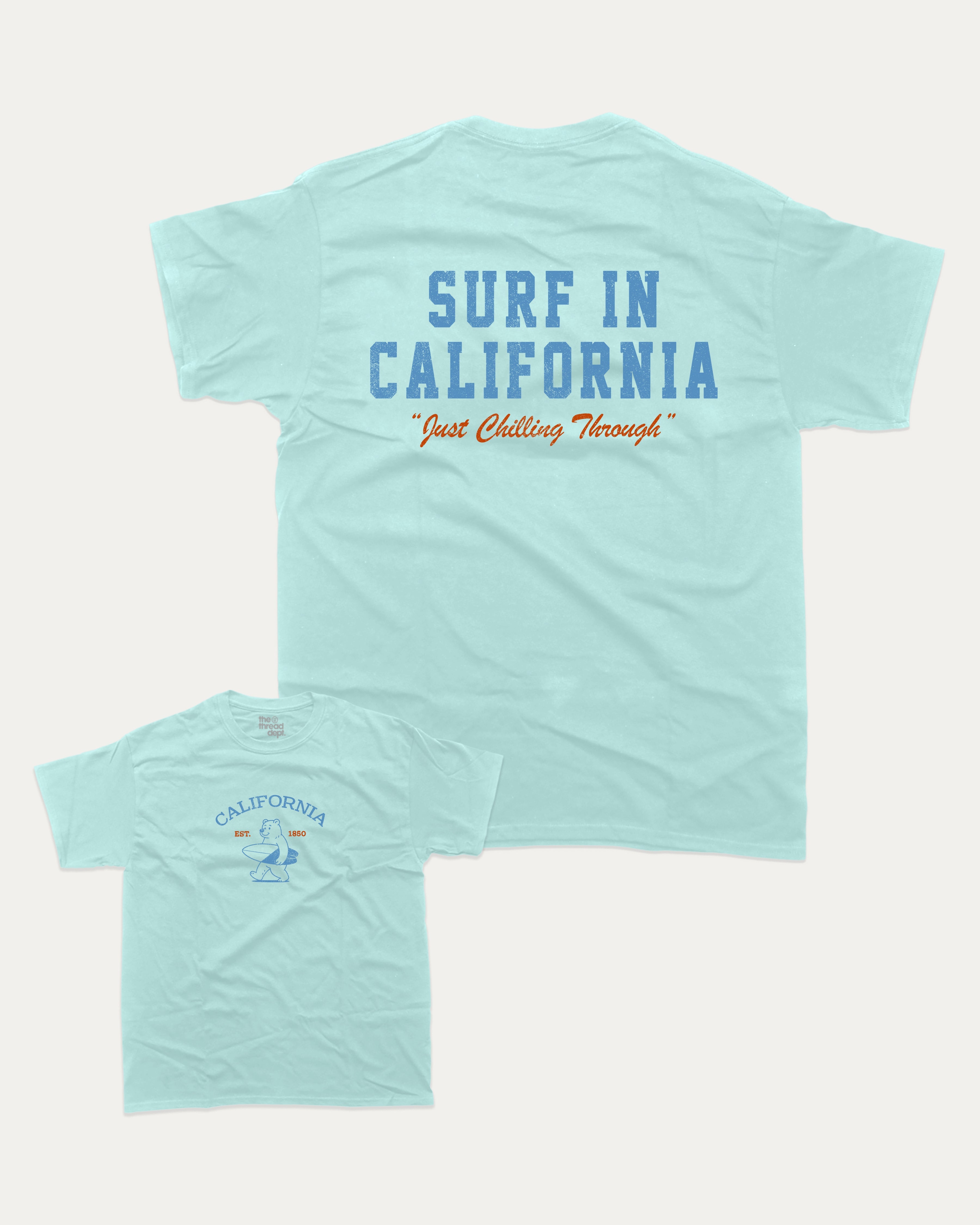 Surf in California graphic tee with bold and humorous print, Retro Inspired Graphic T shirt, Vintage Inspired Graphic T shirt, Perfect Gift for Surfers, State Graphic T shirt, California Graphic T shirt, funny and trendy graphic. Perfect for adults and gift-giving. Celadon shirt.