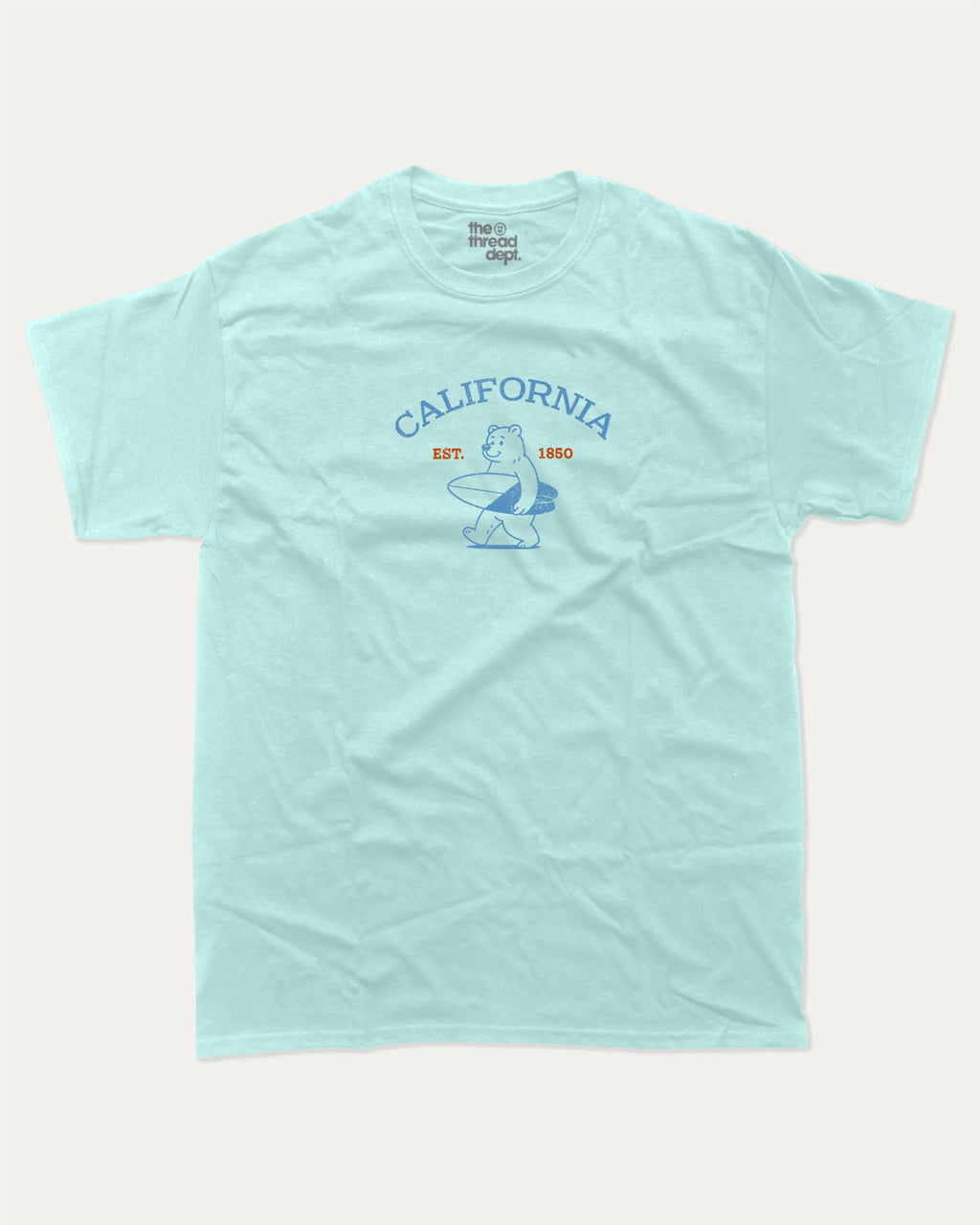 Surf in California graphic tee with bold and humorous print, Retro Inspired Graphic T shirt, Vintage Inspired Graphic T shirt, Perfect Gift for Surfers, State Graphic T shirt, California Graphic T shirt, funny and trendy graphic. Perfect for adults and gift-giving. Celadon shirt.