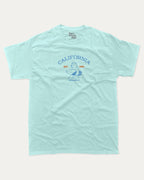Surf in California graphic tee with bold and humorous print, Retro Inspired Graphic T shirt, Vintage Inspired Graphic T shirt, Perfect Gift for Surfers, State Graphic T shirt, California Graphic T shirt, funny and trendy graphic. Perfect for adults and gift-giving. Celadon shirt.