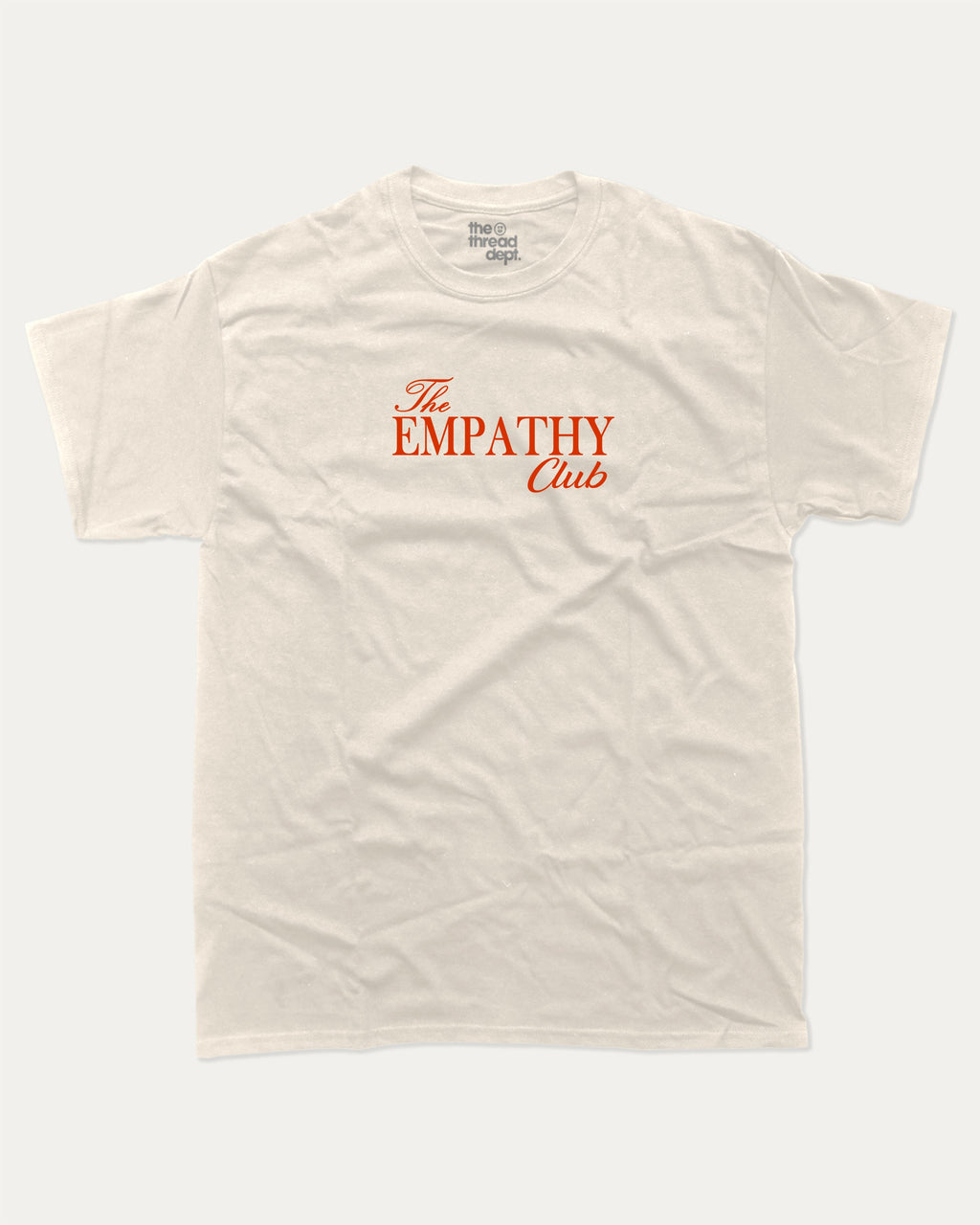 The Empathy Club graphic tee with bold and humorous print, funny and trendy graphic. Perfect for adults and gift-giving. Cream shirt.