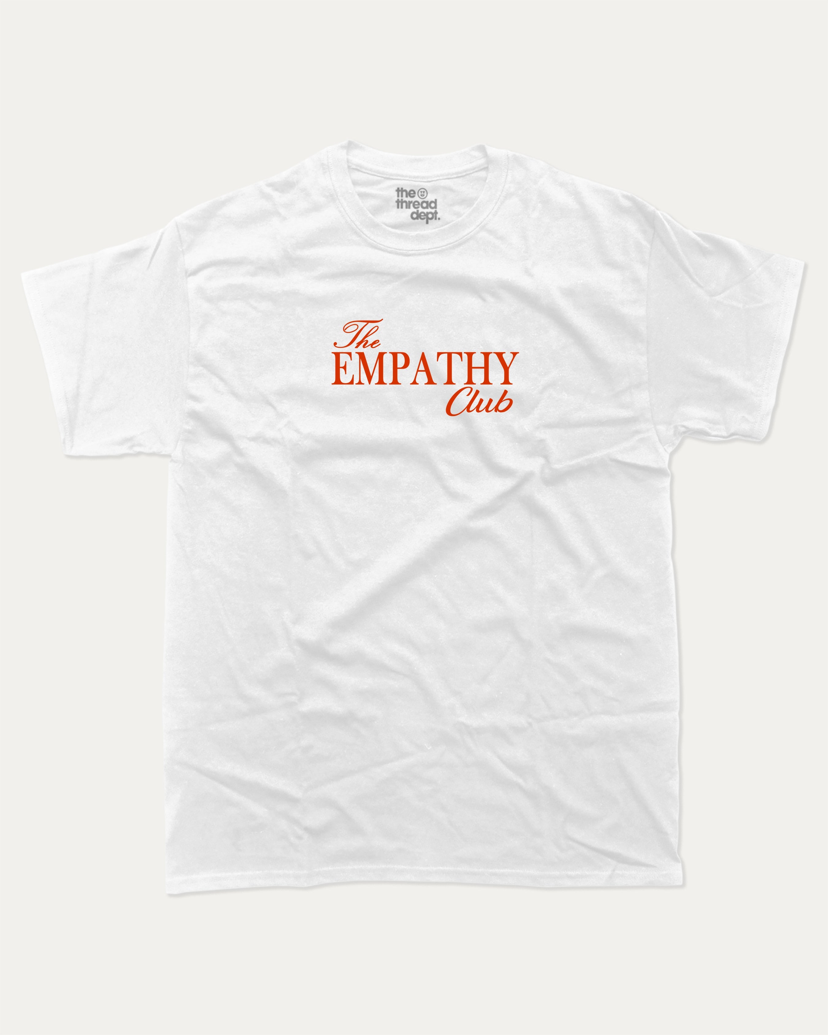 The Empathy Club graphic tee with bold and humorous print, funny and trendy graphic. Perfect for adults and gift-giving. White shirt.