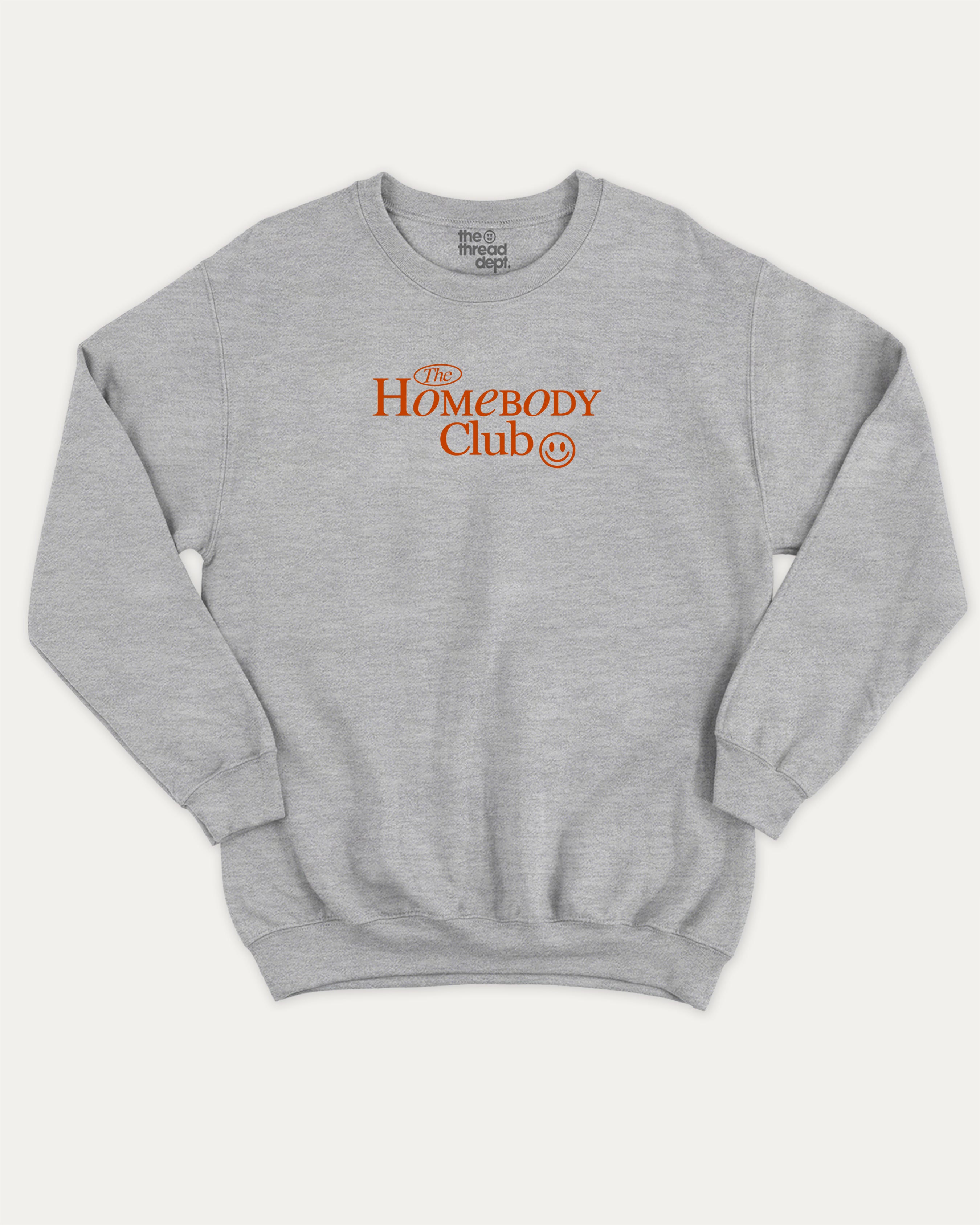 The Homebody Club graphic sweatshirt with bold and humorous print, warm and cozy graphic for everyday wear. Perfect for adults and gift-giving. Heather Grey pullover.