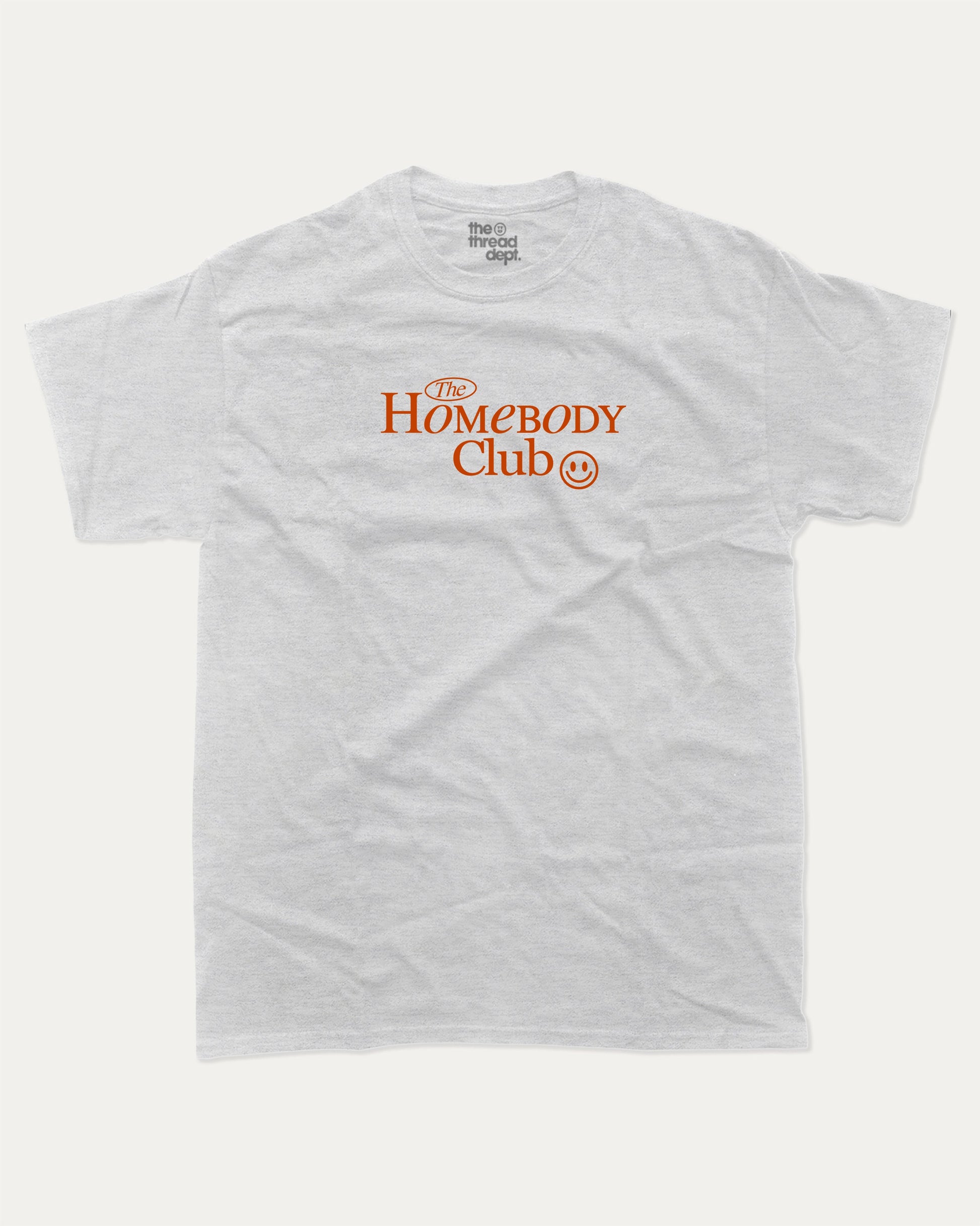 The Homebody Club graphic tee with bold and humorous print, funny and trendy graphic. Vintage Inspired Graphic t shirt, Retro Inspired Graphic T shirt,  Perfect for adults and gift-giving. Ash Grey shirt.