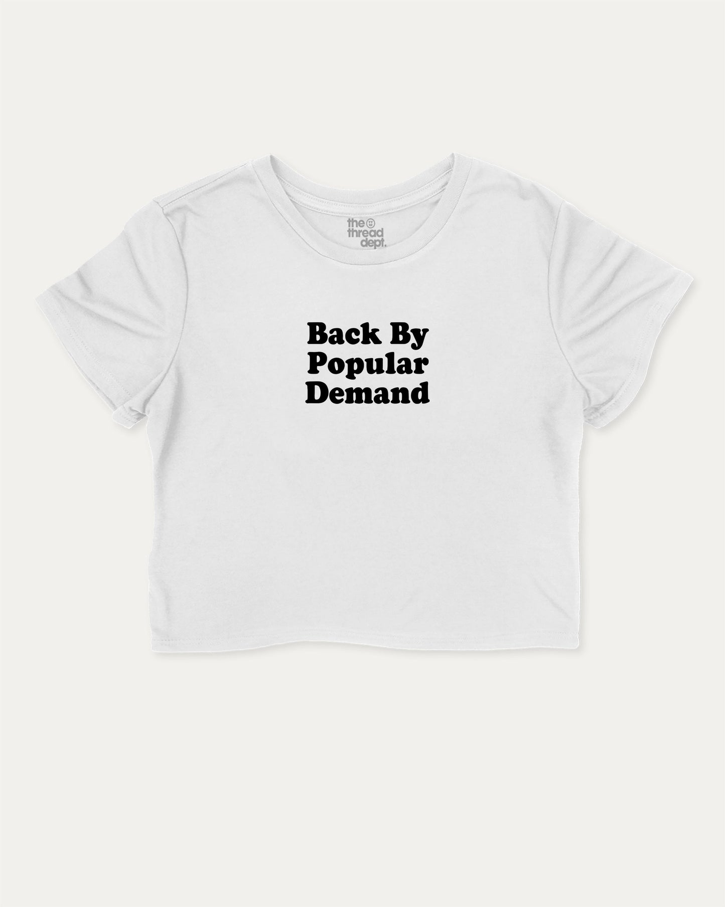 Back By Popular Demand cute and trendy crop tee with nostalgic graphic, perfect for students and teacher. A must-have cropped aesthetic shirt, ideal for daily outfits and casual days. White crop tee