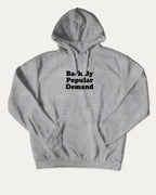 Back By Popular Demand bold graphic hoodie, perfect for adults. funny back to school graphic hoodie, cozy and cool, trending streetwear essential. Heather Grey hoodie