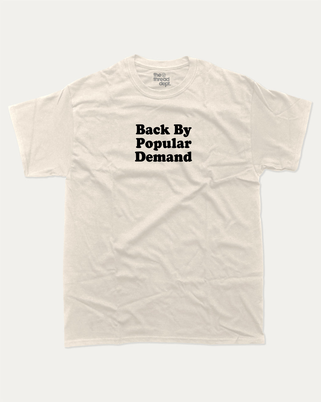 Back By Popular Demand graphic t-shirt, perfect for adults. A must-have funny back to school tee, trending meme shirt, unique gift idea. Cream.